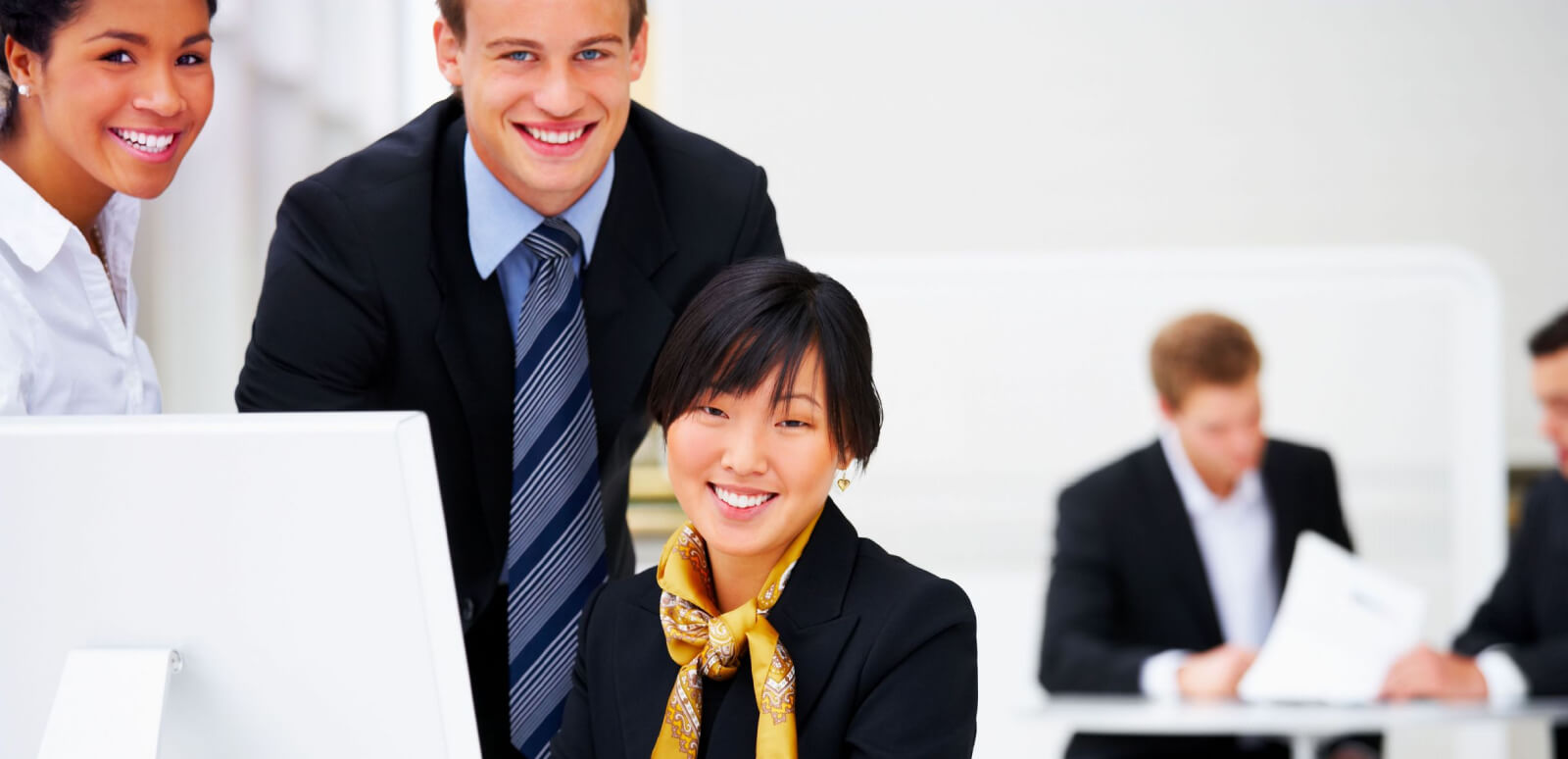 Smiling team members at work